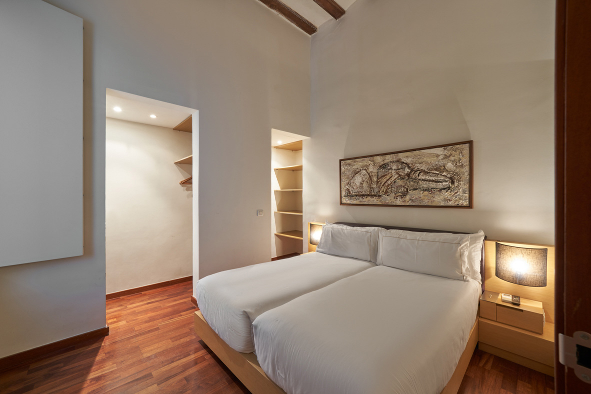 Bed in the Loft room of the Mercer House Bòria BCN